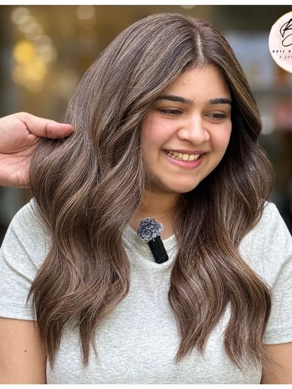 Cool, classy, and effortlessly chic, this ash blonde is the perfect shade for turning heads and owning every room.