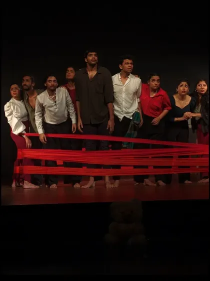 From classroom exercises to the main stage, our work culminates in powerful, original theatre productions. This is a moment from our dance-theatre piece, 'Sea's Fire', where students bring their training and passion to a live audience.