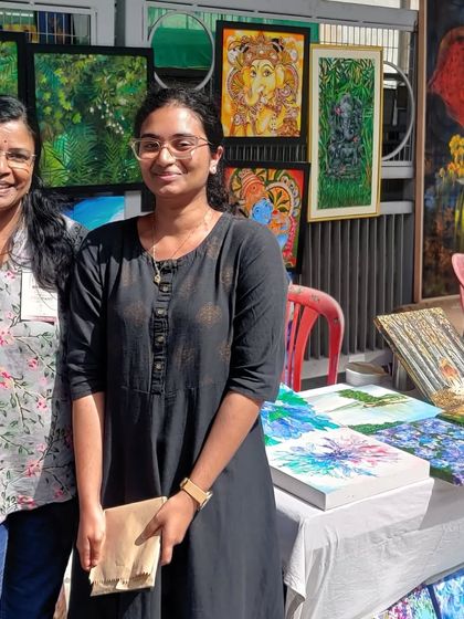 A custom pet portrait of a beautiful Dachshund in a field of flowers. I love capturing the unique personality of our furry family members on canvas.