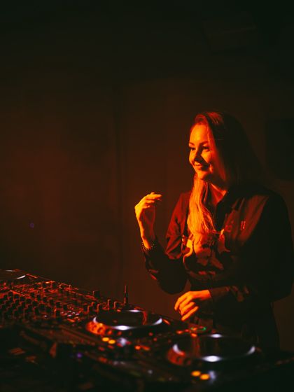 Another happy moment behind the decks. My goal is to create a positive and uplifting experience for everyone.