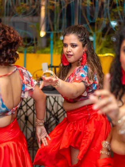 The expressions say it all. A close up shot of our ladies team during a performance, showing the focus, passion, and emotion they pour into every move.