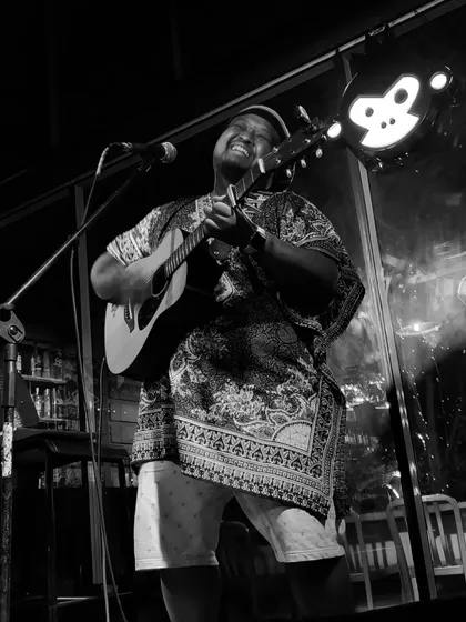 A moment of pure joy captured in black and white during a live gig. For me, music is all about feeling, and this picture says it all. Just me, my guitar, and the vibe.