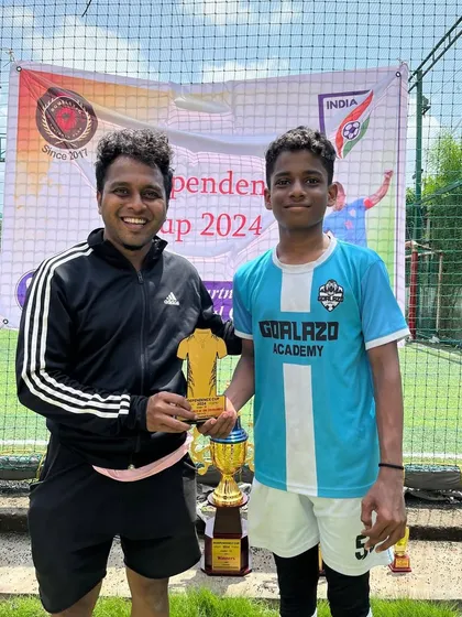 Our coach presenting the Best Defender award to one of our most reliable players from the U-13 and U-15 teams.