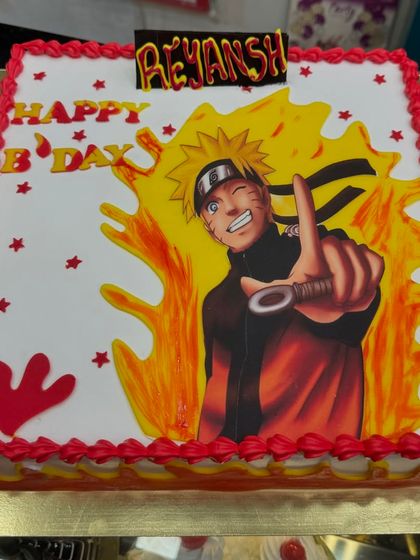 For the anime lover, this Naruto photo cake is a perfect choice. It features a high-quality edible print of Naruto Uzumaki, surrounded by fiery details and a custom nameplate, making it a powerful centerpiece for a fan's birthday.