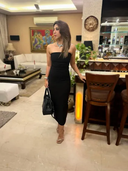 Ready for a night out in a classic black strapless dress. A simple, elegant piece that is always in style.