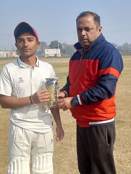 Akshay Jindal receiving his Man of the Match award.