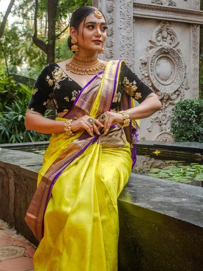A model in a bright yellow saree paired with our temple choker, showing a classic look for festivals like Ugadi or Sankranti.
