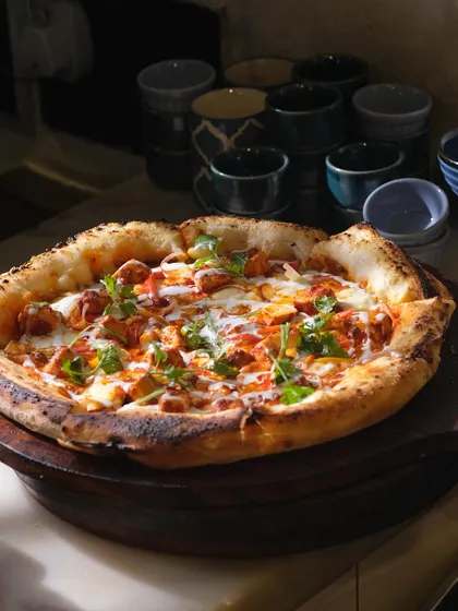 Fresh dough, real ingredients, and a whole lot of love. That’s my recipe for the perfect pizza. This one is topped with spicy paneer for a desi twist.