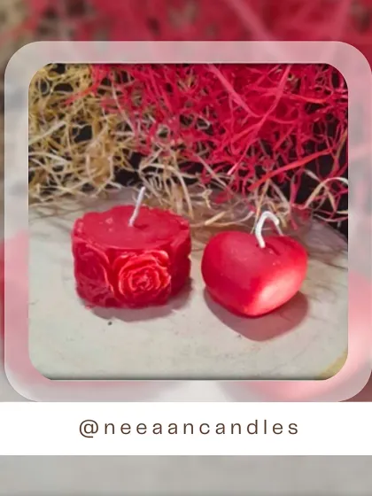 Love in every flicker. This set of a red rose-carved candle and a heart-shaped candle is perfect for a romantic glow.