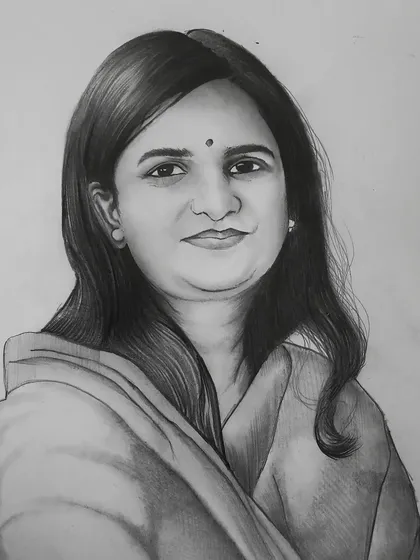 A classic A4 size individual portrait made with graphite pencils. This is a great example of my standard commission work, where I focus on creating a realistic and soulful representation of a person from their photo.