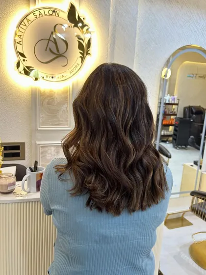 The back view of this caramel blond style, showing how the colour adds depth and dimension.