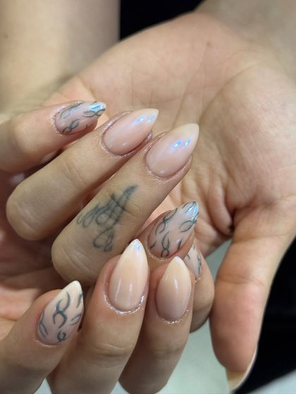 This set was done for the talented Aroob Khan. The minimalist flame design is so chic.