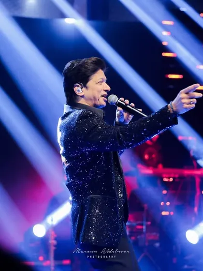 The legendary singer Shaan captivating the audience. I secure and coordinate with top artists to ensure your Sangeet night is an exclusive and unforgettable musical event.