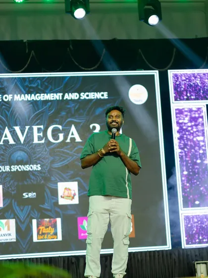 On stage as a judge for a college dance competition. It's always inspiring to see the next generation of dancers, and I enjoy sharing my experience and encouraging new talent in the community.