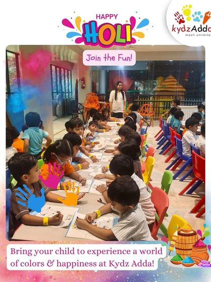 A vibrant scene from our Holi celebration, where a large group of children are seated together, joyfully engaged in a themed coloring activity.