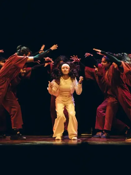 A powerful storytelling moment from one of our group performances, showcasing intricate choreography and emotional expression.