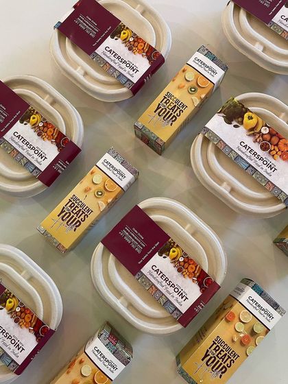Our eco-friendly and beautifully designed packaging ensures your meals arrive fresh and ready to enjoy. This image shows a collection of our packed meals.