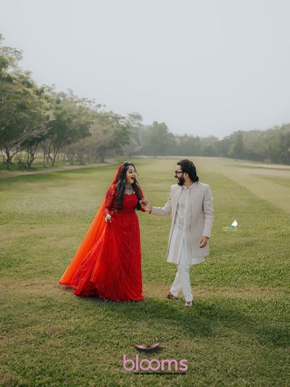 A beautiful outdoor shot of Unboxing Dude and his bride. His elegant sherwani and our grooming services created a perfect look for their special day.