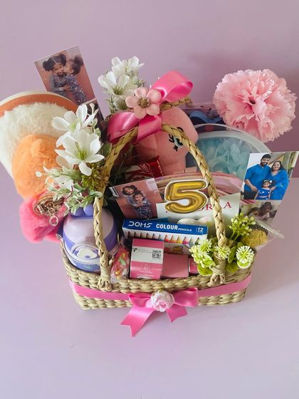 Another view of the 5th birthday basket, showing the colorful and age-appropriate items I selected for the little one.
