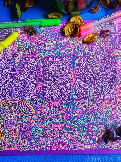 This intricate neon artwork spelling 'MOM' was created with gelly roll pens on dark paper. It was a challenging and rewarding piece made during a live session, filled with detailed zentangle patterns.