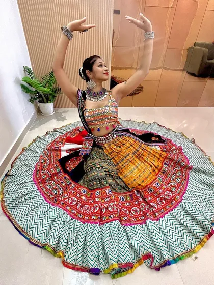 Another beautiful pose showcasing the full circle of the lehenga skirt. The mix of colors and patterns is simply breathtaking.