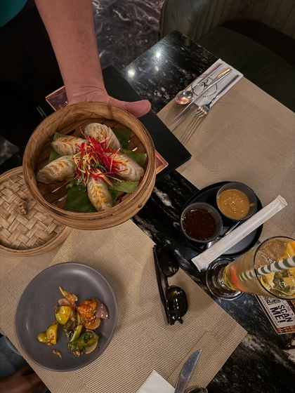 A top-down shot of the delicious momos served at Limitless. Food photography is key to a great restaurant feature.