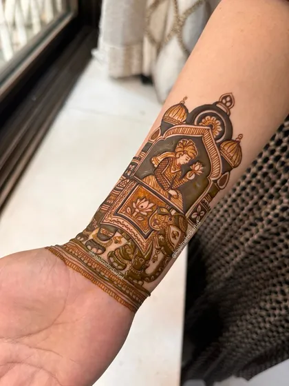 A side view of the groom on an elephant design, showing the details from another perspective.
