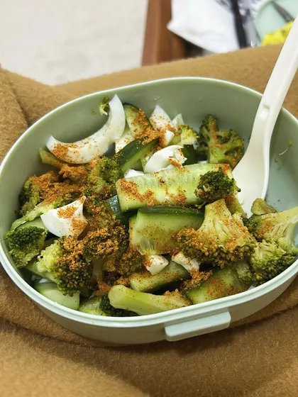 A bowl of broccoli and cucumber salad. A simple, crunchy, and low-calorie side dish that is great for digestion.