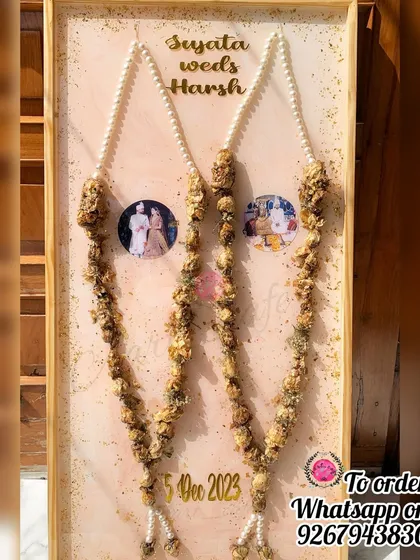 My biggest varmala frame ever. The client wanted both varmalas preserved in their entirety, and the result is this magnificent, touchable piece of art.