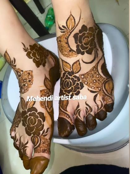 A bold floral design for the feet, with large, shaded roses creating a dramatic and beautiful statement.