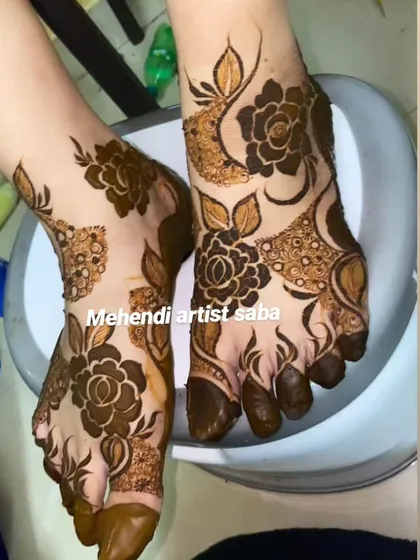 A bold floral design for the feet, with large, shaded roses creating a dramatic and beautiful statement.
