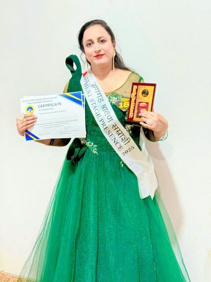 Another winning client! She won the 'Best Stage Presence' award in this stunning emerald green ball gown. I'm so proud of my clients.