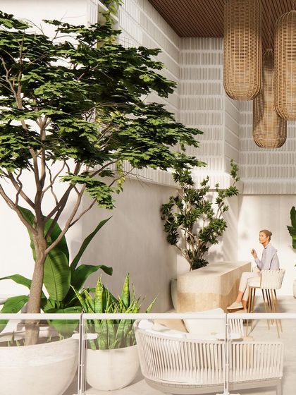 The outdoor terrace is a serene escape, with comfortable seating, lush greenery, and a view of the sky.