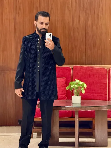 Rocking a traditional look for a wedding in Delhi. I believe in matching my style to the event's vibe, whether it's with my outfit or my music.