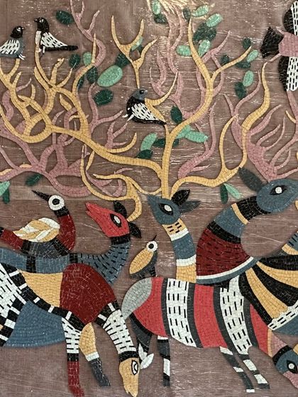 The full composition of the Gond-inspired mosaic, showcasing the rich colors and dynamic movement of the figures.