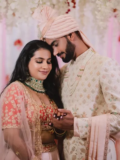 An intimate couple portrait from their reception. The bride's makeup is soft and romantic.