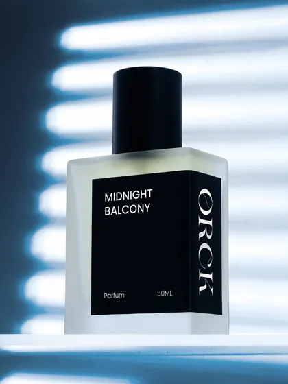 This is where I tell a story. For this perfume, 'Midnight Balcony,' I used creative shadow play and focused lighting to evoke a sense of mystery and allure. This conceptual approach helps build a strong brand identity beyond just showing the product.
