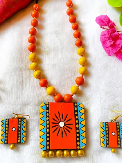 The same square pendant daily-wear set, here in a bright orange and yellow combination.