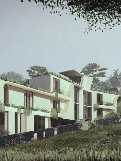 Our Moira Homes project demonstrates how we respond to challenging topography. The buildings are terraced along the natural slope of the site, minimizing excavation while creating dynamic forms with inclined overhangs that provide shade and integrate planters directly into the facade.