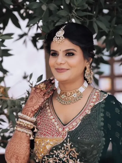 A beautiful portrait of the bride for her carnival event. Her makeup is flawless, and her smile is radiant.
