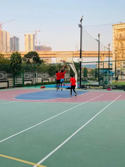 A fast break opportunity, with players sprinting down the court.