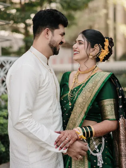 A look of pure adoration between the newlyweds. This candid moment, captured post-ceremony, is full of the quiet joy and love that follows the wedding vows.