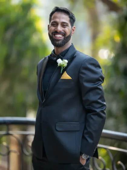 A genuine, happy smile from the groom. I love capturing these relaxed, candid moments that show his true personality.