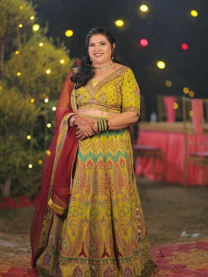 My beautiful client glowing in a lime green and yellow lehenga with multi-color threadwork. This is a fantastic choice for a Mehendi or a day wedding.