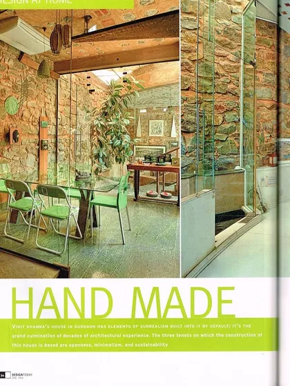 The interior of this home celebrates its "hand-made" origins, where every detail is intentional. I used exposed local quartzite stone for the walls to provide natural texture and thermal mass, contrasting it with modern glass and simple furnishings. This space demonstrates my belief that sustainable design can be both rustic and refined.