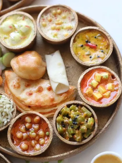 Look at the detail in this North Indian thali. I love recreating the textures of each dish, from the creamy paneer butter masala to the fluffy rice and soft paratha. It’s a feast for the eyes.