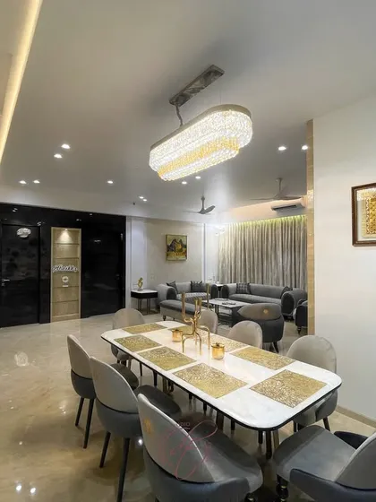 A perspective shot looking from the dining area towards the living room. This highlights the open and connected feel of the space, perfect for modern lifestyles where living and dining often merge.