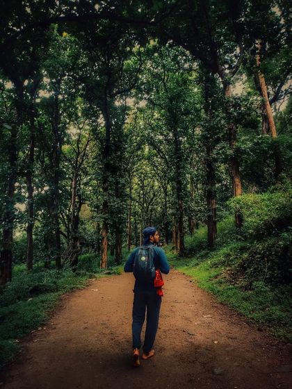 Walking a forest path, I feel a deep connection to the natural world. My journey with yoga has taught me to find stillness and healing not just on the mat, but in every moment and every environment.