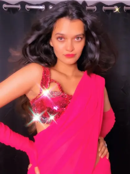 A photoshoot inspired by the iconic saree looks of Bollywood. I draw inspiration from films for both my choreography and my personal style.