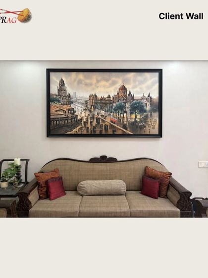 This large architectural painting of Mumbai finds its perfect home above a sofa, bringing the dynamic energy of the city into a client's living space. The simple black frame ensures it complements the room's existing decor.